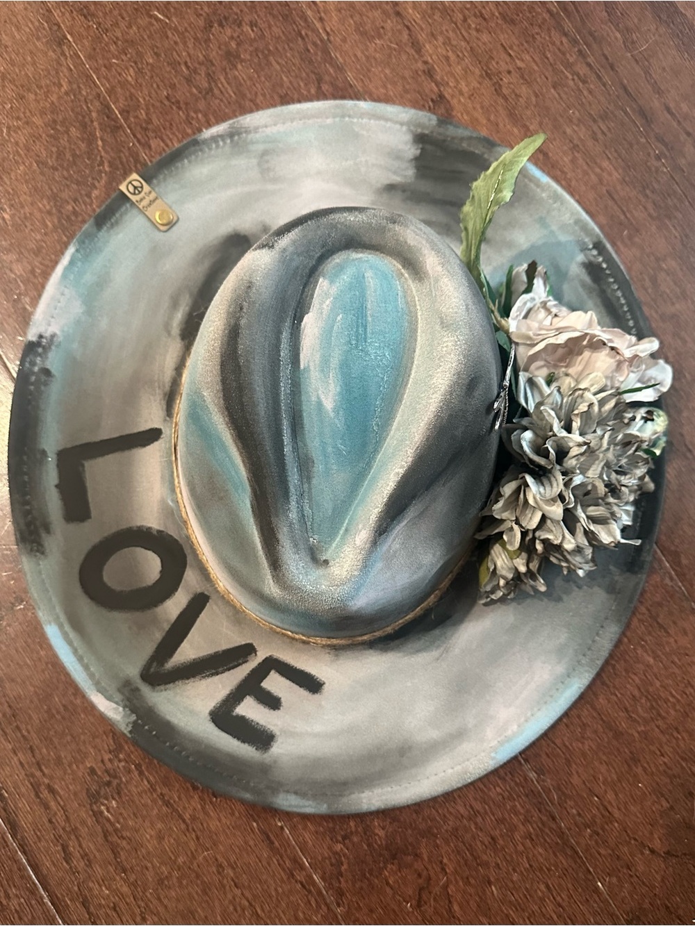 Hand-Painted Wide Brim Hat with Floral Accent - LOVE Detail